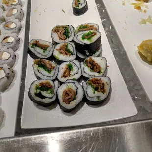 a variety of sushi and rolls