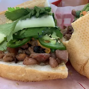 Pork Banh Mi, dressed, on  a fresh Dong Phuong loaf.