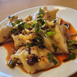 1/2 order spicy wontons w/ chili oil