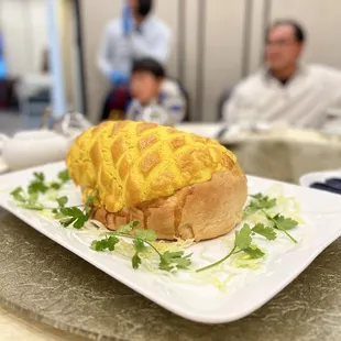 Bake pineapple bun with stuffed chicken inside $42