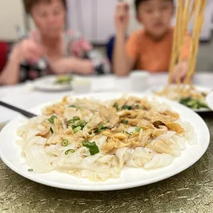 Empress clam steam over noodles