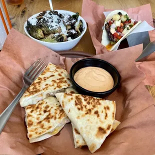 quesadilla, salad, and salad dressing