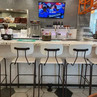 a view of the counter and bar area