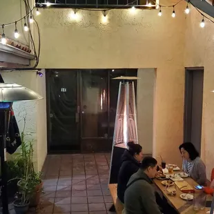 a group of people sitting at a table