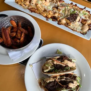 Bulgogi fries, bulgogi tacos, and sweat potato fries. Super delicious!!