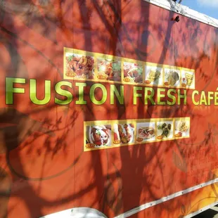 a food truck parked on the side of the road