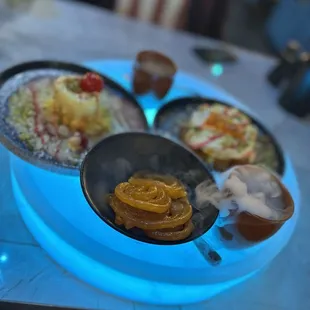 Malpua, jalebi, kulfi with rabdi