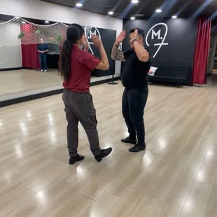 Final demo - during lessons, dance partners high-five before rotating, gives a nice bit of "woo-hoo" energy