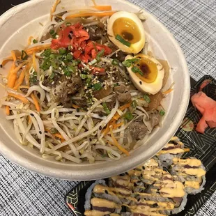 a bowl of noodles with meat and vegetables