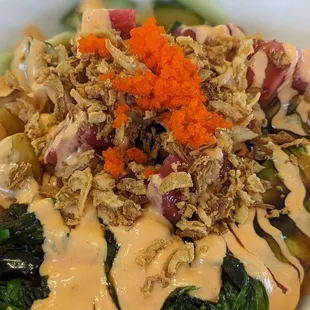 Tuna poke bowl with sirracha.