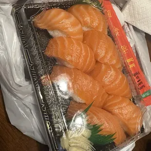 8 pieces of fresh Salmon nigiri to go! With plenty of included soy sauce, wasabi, and ginger.