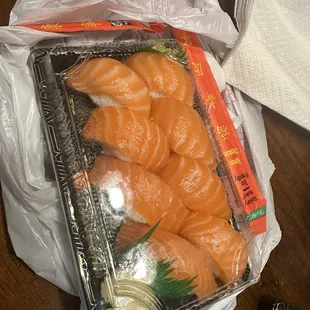 8 pieces of fresh Salmon nigiri to go! With plenty of included soy sauce, wasabi, and ginger.