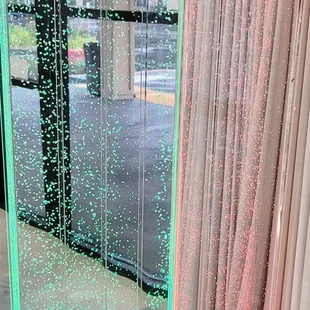 Red and Green duo color bubble wall at entrance.