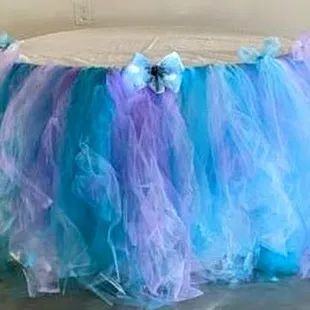Hand made tule skirt for the cake table. Some things you just can't buy online.