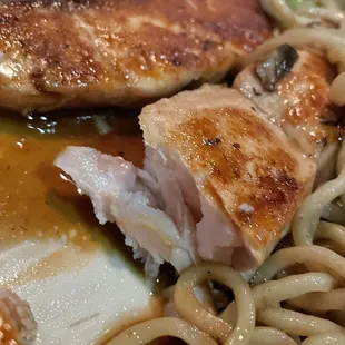 Overcooked, yet raw Salmon.