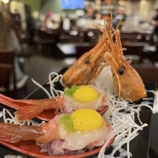 a plate of shrimp and eggs