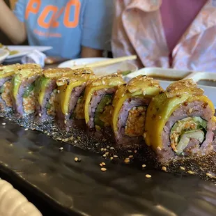 Fresh roll topped w mango/lemon