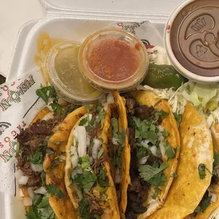 2 Birria tacos and 2 asada tacos