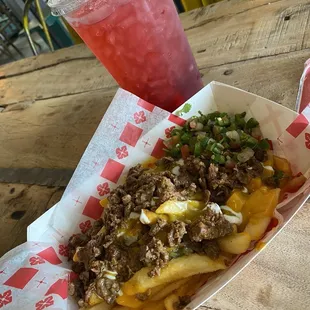 Carne Asada Fries and hibiscus aqua Aguas Frescas