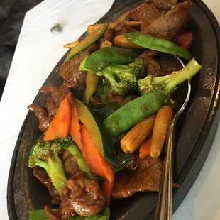 Sizzling lamb. Good. I would recommend