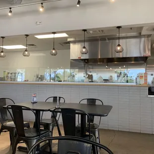 a view of the kitchen and dining area