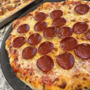 Meal Prep
Pepperoni Pizza
Buffalo Chicken Pizza
Homemade dough and sauce.