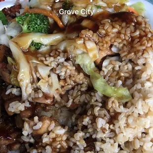 a plate of rice and vegetables