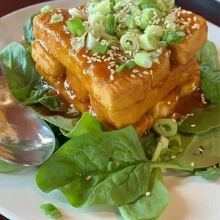 tofu and spinach on a plate