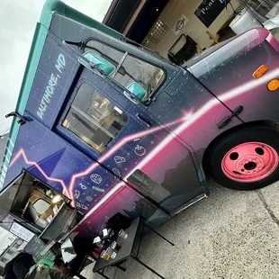 a truck parked on the side of the road