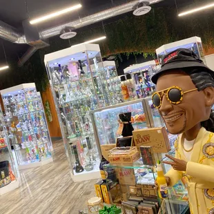 Glass bong featuring bobble head snoop