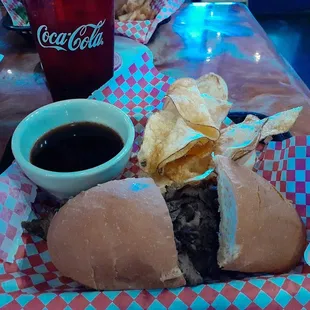 Fuzzy&apos;s French Dip with house made fries and a coke.