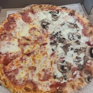 Cheese Pizza half mushroom half pepperoni Delicious