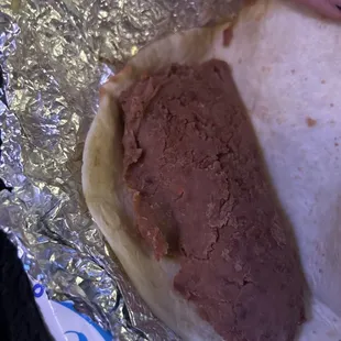 Bean and cheese burrito my ass. This looks like someone shit between a tortilla