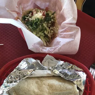Bottom is bean and cheese burrito  top is a Fajita Chicken Taco