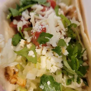a close up of a taco