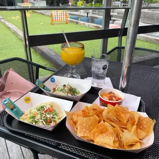 Chips &amp; Queso, Shredded Chicken Taco, Tempura Mahi Taco, frozen mango margarita