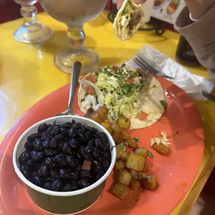 Taco Plate with beans and potatoes