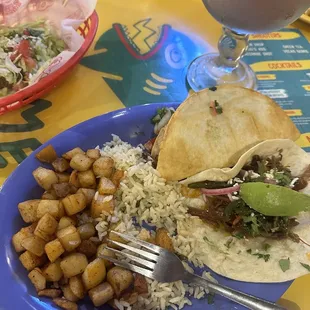Taco Plate with rice and potatoes