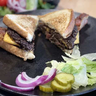 Double burnt burger with bacon and sliced grocery store bread