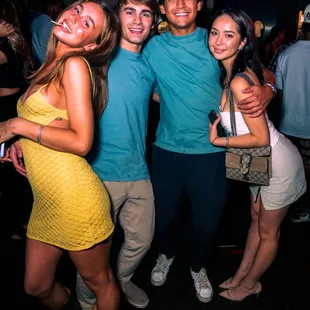 a group of friends posing for a picture