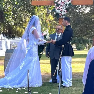 Mr. And Mrs. Cusack exchanging vows