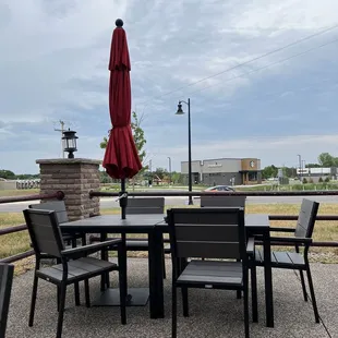 a table and chairs on a patio