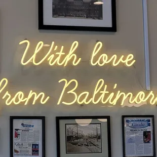 a neon sign that reads with love from baltimore
