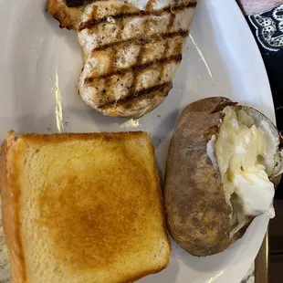 Chicken filet with baked potato and Texas toast