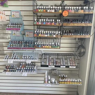 Our wall of water and oil based food colorings. We also carry bigger sizes on a different shelf.