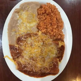 Enchiladas, rice and beans - my friends favorite!