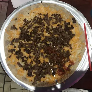 Quesadilla with Carne Asada! Straw for reference on the ginormity! Is that a word?