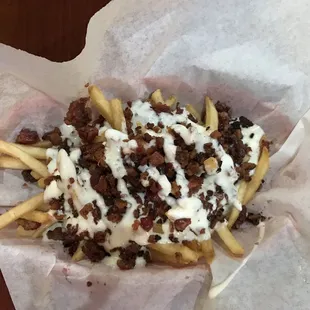 My kids favorite - Bacon Ranch Fries  Y'all they use REAL BACON!