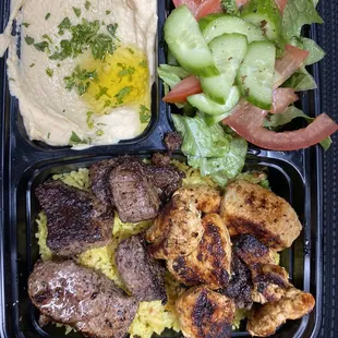 Beef tenderloin, marinated chicken kabob, hummus, salad with signature dressing