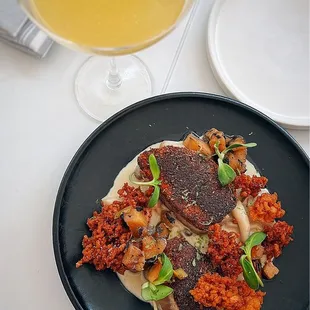 Blackened Albacore over Tom Kha sauce with grilled apple bits, crispy potato nests &amp; shimeji mushrooms